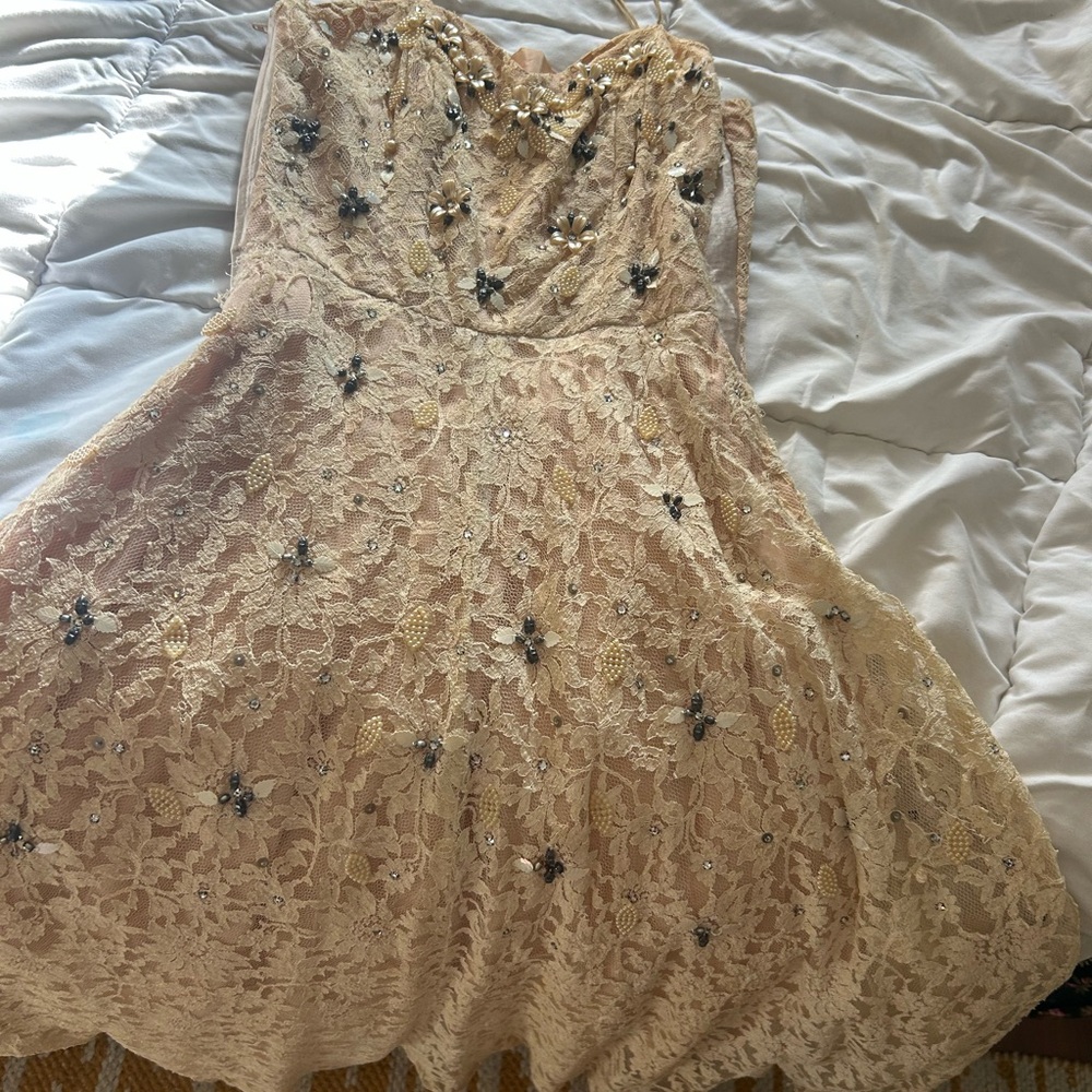 Vintage Lace Dress with Floral Embellishments